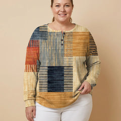 Patchwork Print Henley Sweater worn by a woman with curves