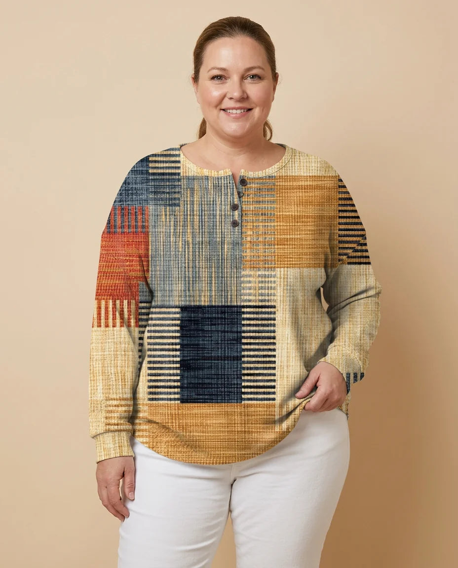 Patchwork Print Henley Sweater worn by a woman with curves