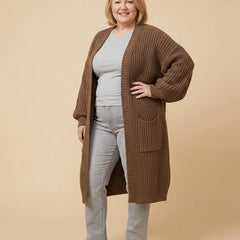 Long Oversized Open Cardigan worn by a woman with curves