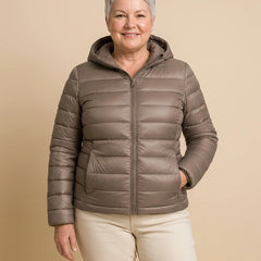 Lightweight Hooded Puffer Jacket worn by a woman with curves