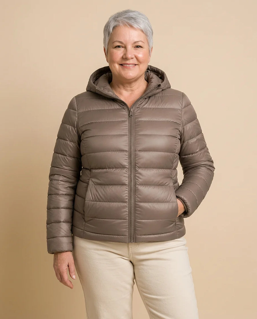 Lightweight Hooded Puffer Jacket worn by a woman with curves
