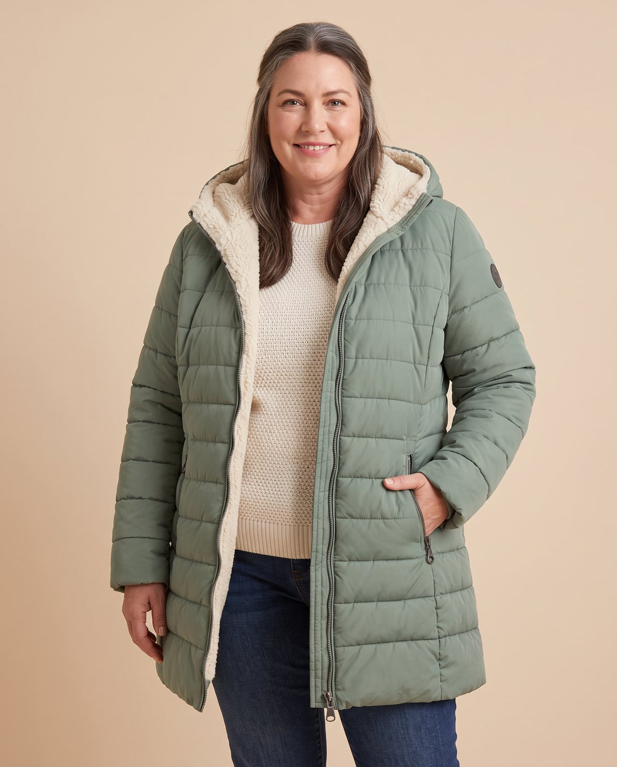 Anna | Hooded A-Line Puffer Coat worn by a woman with curves