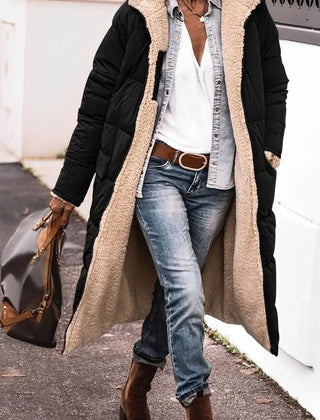 Annette reversible long puffer coat in Black, worn