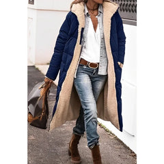 Annette reversible long puffer coat in Navy, worn