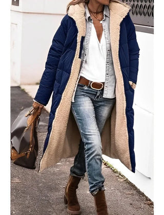 Annette reversible long puffer coat in Navy, worn
