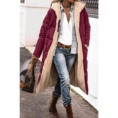 Annette reversible long puffer coat in Burgundy, worn