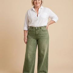 High-Rise Wide-Leg Jeans worn by a woman with curves