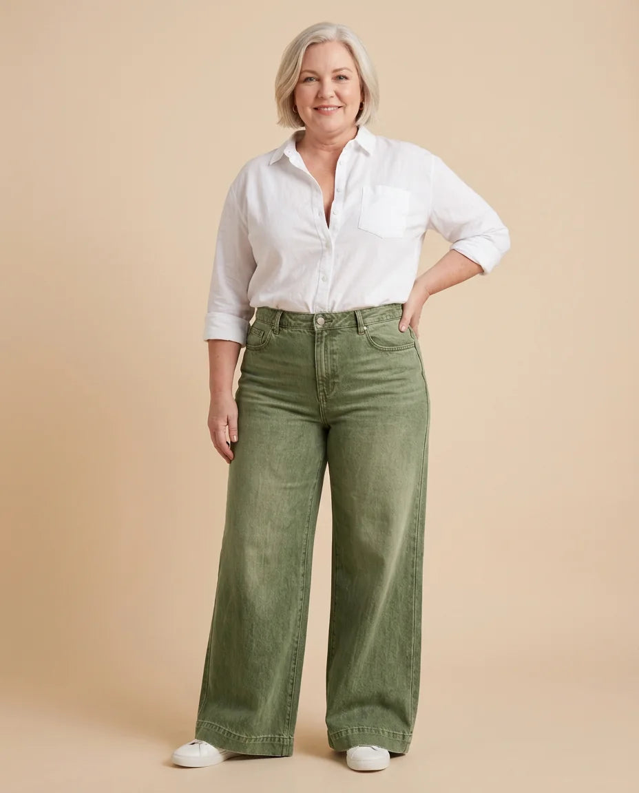 High-Rise Wide-Leg Jeans worn by a woman with curves