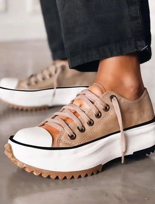 Bettina Platform Lace-Up Sneakers in Beige, worn with black jeans
