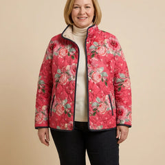 Rose Print Quilted Jacket worn by a woman with curves