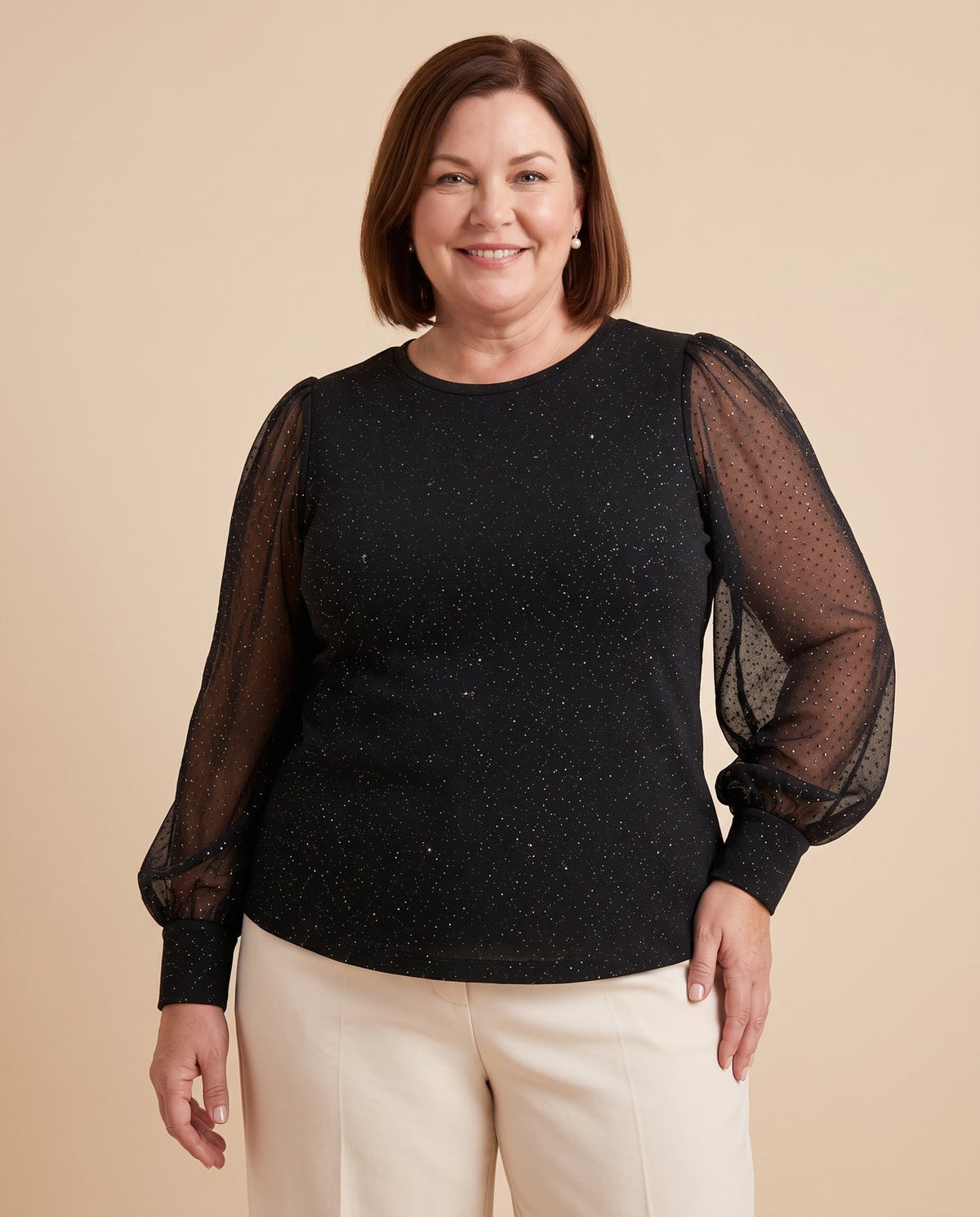 Celeste | Sheer Sleeve Shimmer Blouse worn by a woman with curves