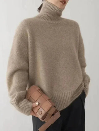 Corinne ribbed turtleneck sweater in Camel, worn