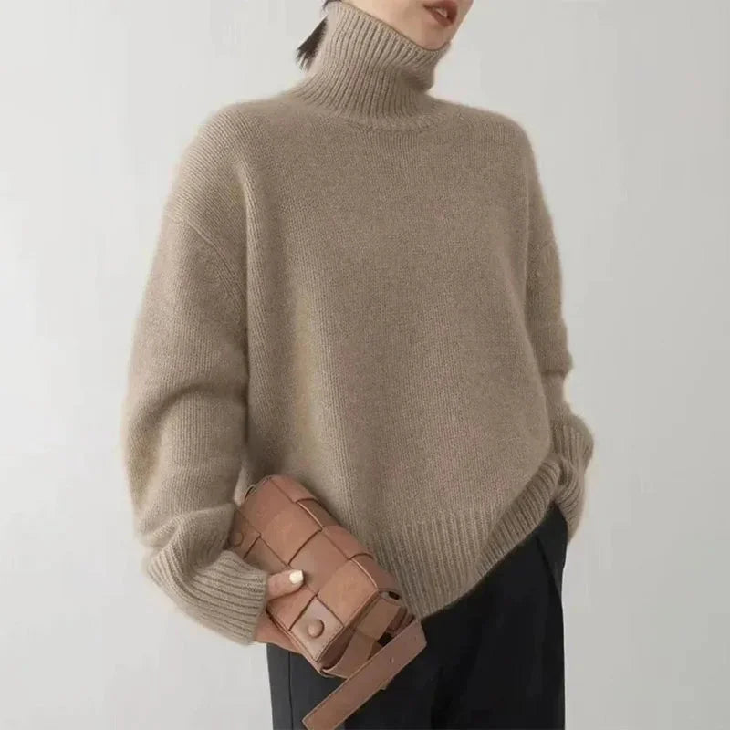 Corinne ribbed turtleneck sweater in Camel, worn