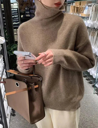 Corinne ribbed turtleneck sweater in Coffee, worn