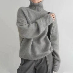 Corinne ribbed turtleneck sweater in Gray, worn
