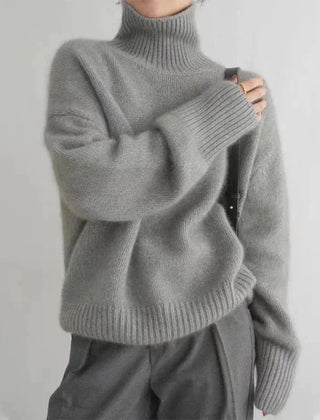 Corinne ribbed turtleneck sweater in Gray, worn