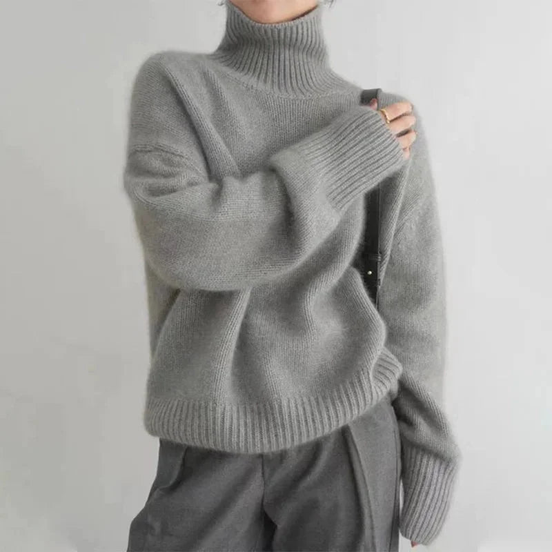 Corinne ribbed turtleneck sweater in Gray, worn