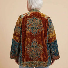 Back view of the Boho Embroidered Kimono Cardigan in Burgundy on a woman with curves