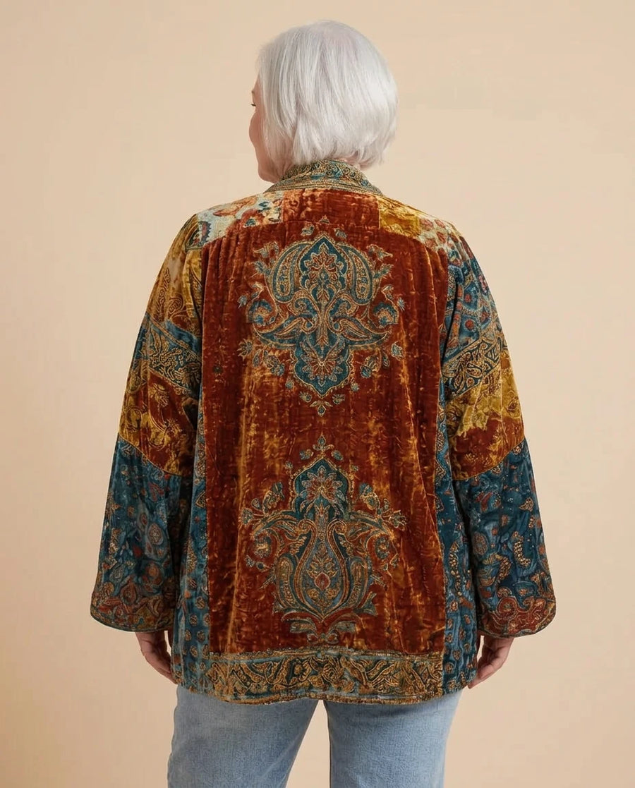 Back view of the Boho Embroidered Kimono Cardigan in Burgundy on a woman with curves