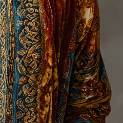 Close-up of the gold-patterned front band of the Boho Embroidered Kimono Cardigan in Burgundy
