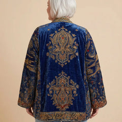 Back view of the Boho Embroidered Kimono Cardigan in Navy on a woman with curves
