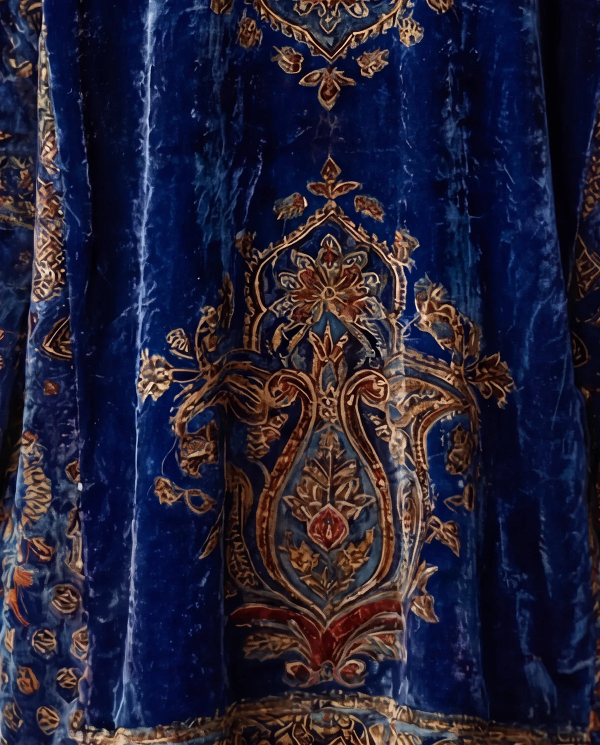 Close-up of the medallion on the back of the Boho Embroidered Kimono Cardigan in Navy