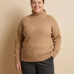 Diamond Pattern Turtleneck Sweater worn by a woman with curves