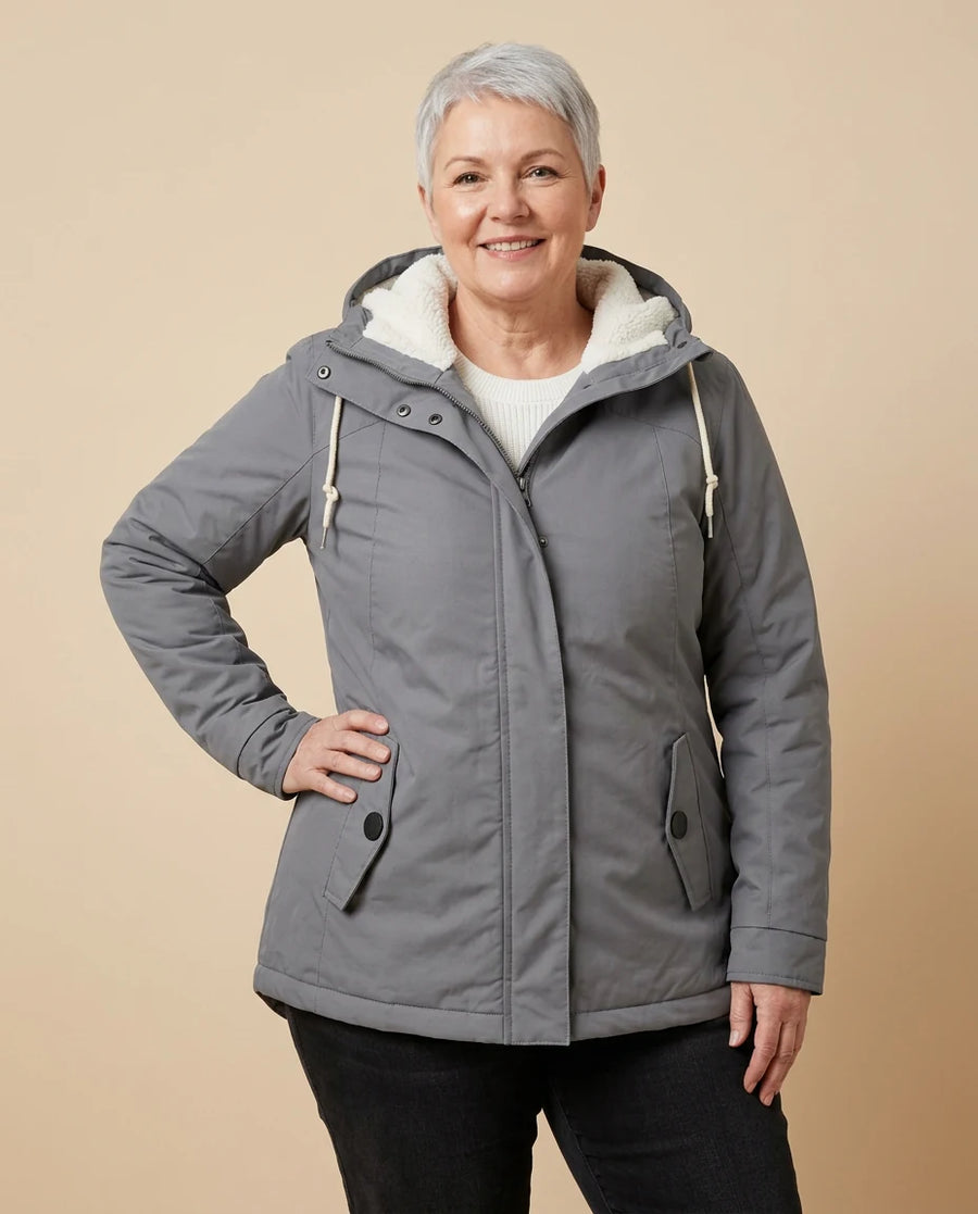 Elsie Belle | Pleated Hooded Coat worn by a woman with curves