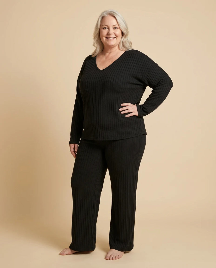 Evangeline Ribbed Knit Lounge Set worn by a woman with curves