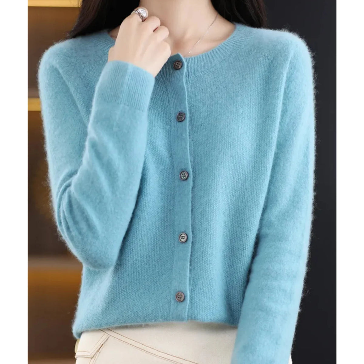 Fernanda round neck button cardigan in Light Blue, worn