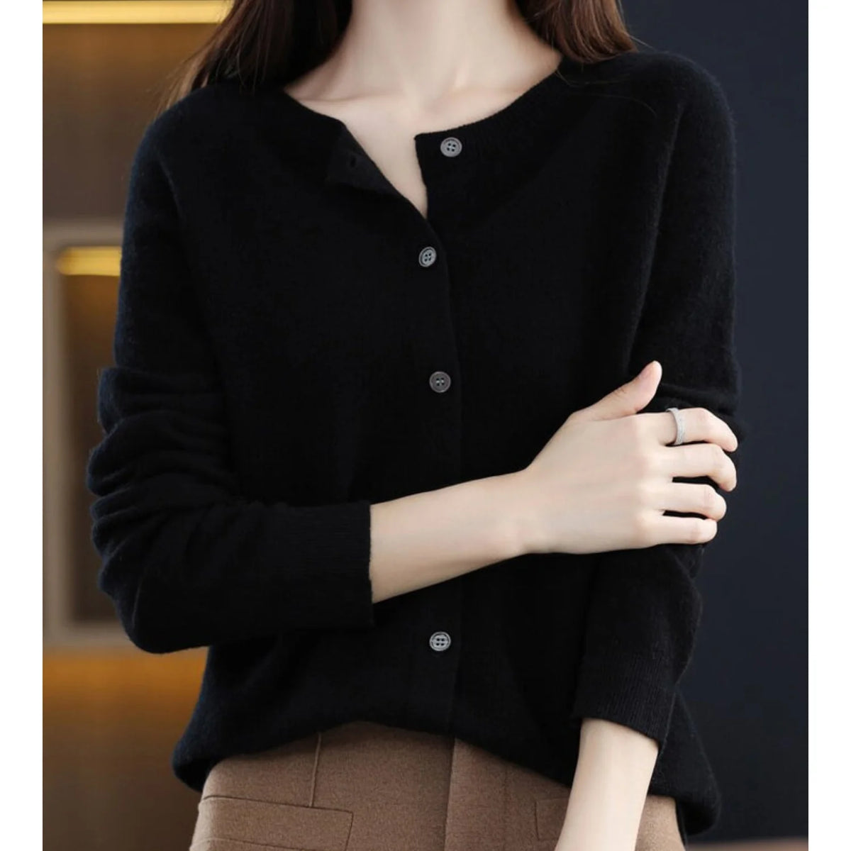 Fernanda round neck button cardigan in Black, worn