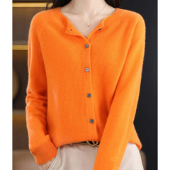 Fernanda round neck button cardigan in Orange, worn