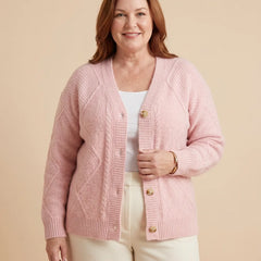Cable Pattern V-Neck Button Cardigan worn by a woman with curves