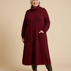 Turtleneck Sweater Maxi Dress with Pockets worn by a woman with curves