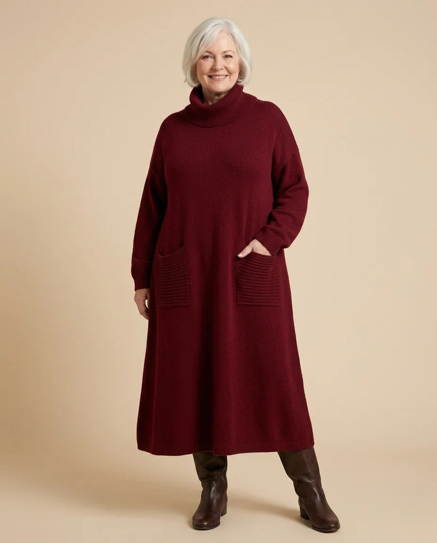 Turtleneck Sweater Maxi Dress with Pockets worn by a woman with curves