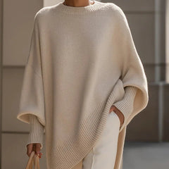 Lucia oversized asymmetric hem sweater in beige, worn