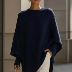 Lucia oversized asymmetric hem sweater in navy, worn