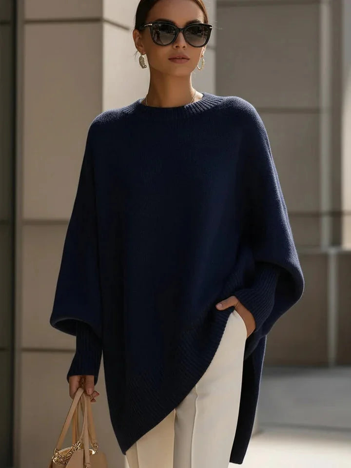 Lucia oversized asymmetric hem sweater in navy, worn