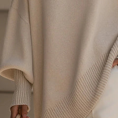 Lucia oversized asymmetric hem sweater in beige, hem detail