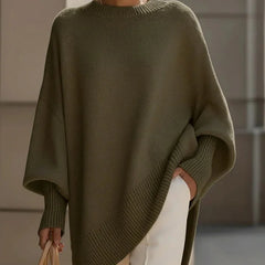 Lucia oversized asymmetric hem sweater in green, worn