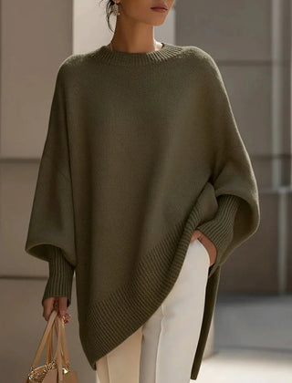Lucia oversized asymmetric hem sweater in green, worn