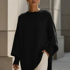 Lucia oversized asymmetric hem sweater in black, worn