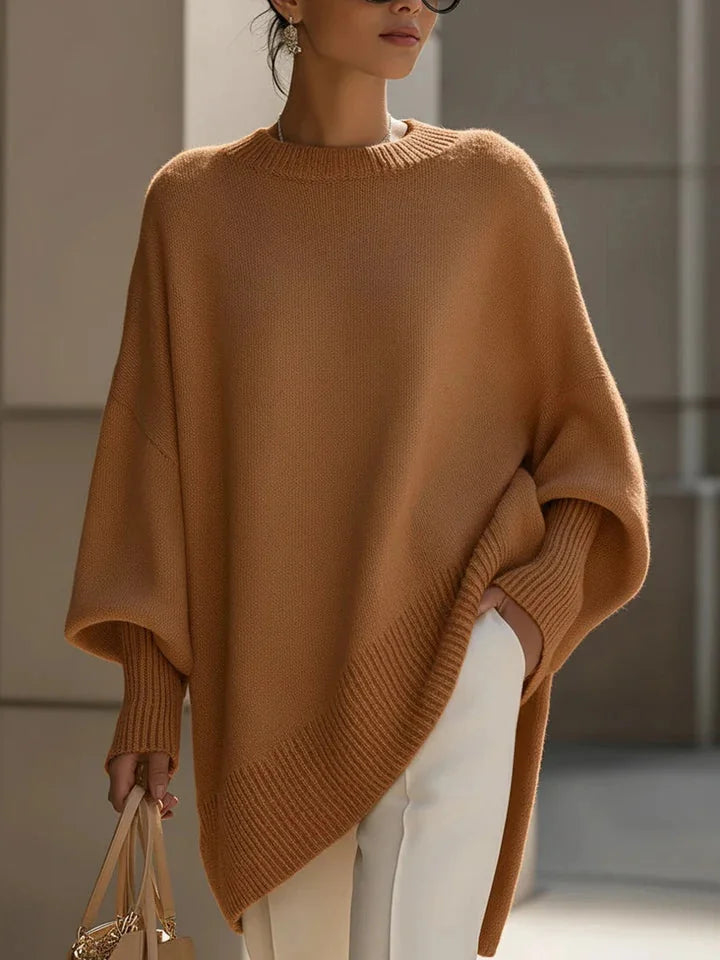 Lucia oversized asymmetric hem sweater in camel, worn
