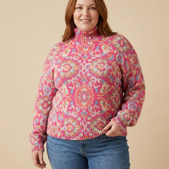 Paisley Pattern Turtleneck Sweater worn by a woman with curves