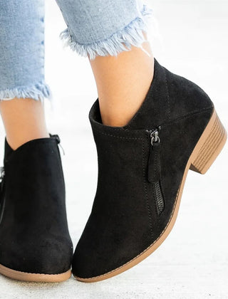 Marisol block heel ankle boots in Black, worn