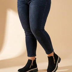 Gold Zip Lug Sole Ankle Boots worn by a woman with curves