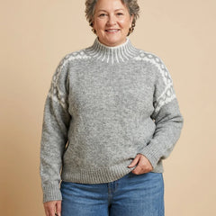 Contrast Pattern Mock Neck Sweater worn by a woman with curves