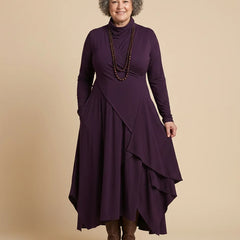 Asymmetric Draped Mock Neck Maxi Dress worn by a woman with curves
