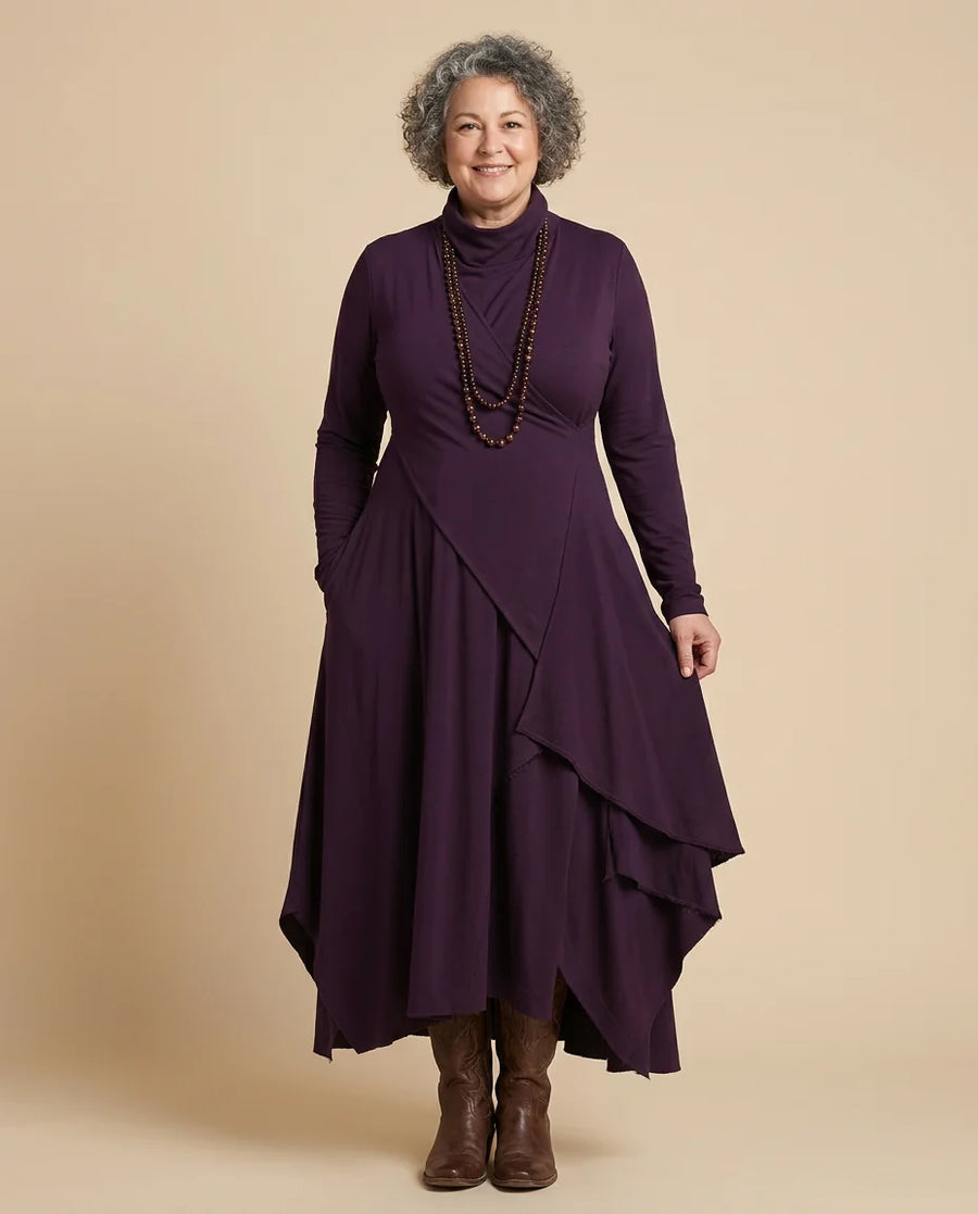 Asymmetric Draped Mock Neck Maxi Dress worn by a woman with curves