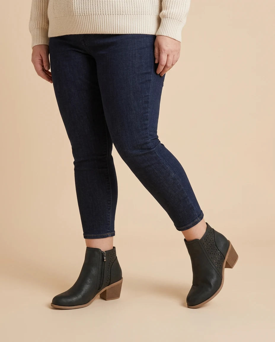 Tessa | Cutout Block Heel Ankle Boots worn by a woman with curves